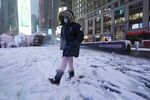 Winter storm snarls travel, gives some schools the day off